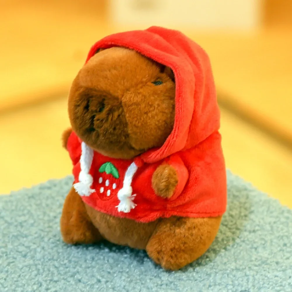 Sc06968bde9c84c21a5209388cd2b1114M Cute Small Size Capybara Plush Toy With Wings Hoodie Simulation Capybara Doll Fluffty (New) - Image 1