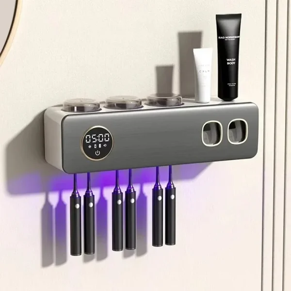 uv-toothbrush-holder-deep-sterilizer-toothpaste-squeezer-light-energy-usb-charging-fast-drying-wall-mounted-bathroom-storagerack-600x600 UV Toothbrush Holder Sterilizer Toothpaste Squeezer USB Charging Wall Mounted Rack (New) - Image 1